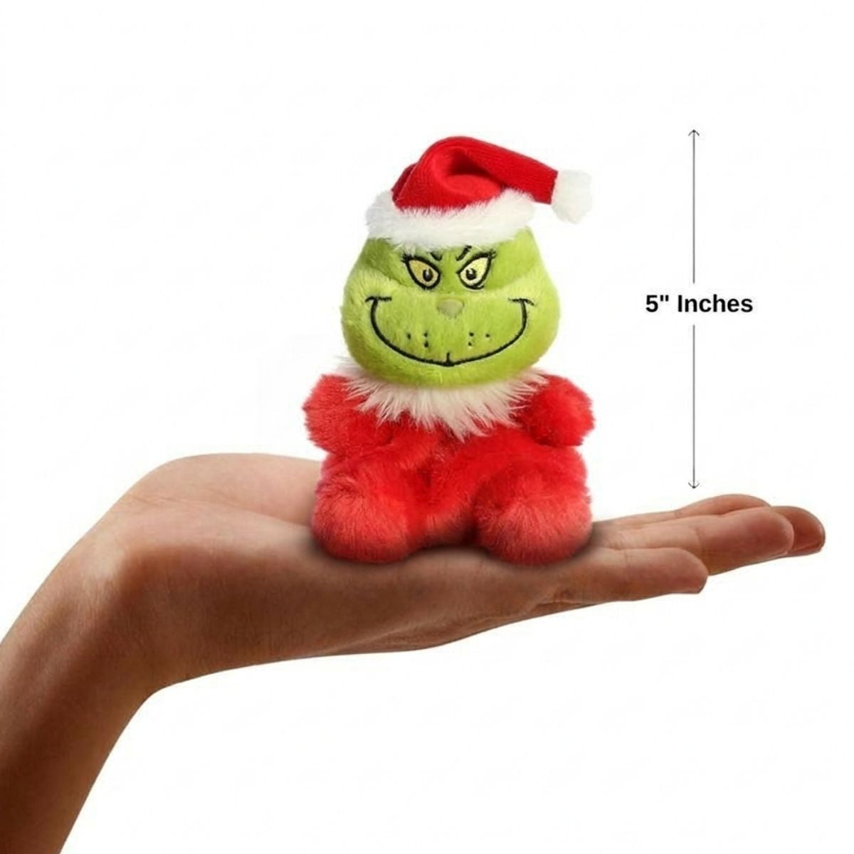 The miniature Santa Grinch plush sitting balanced in an open human hand under a 5-inch height graphic indicator.