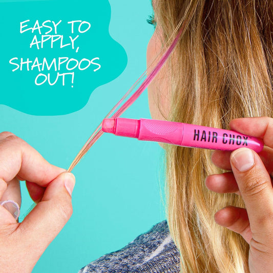 Person using a pink hair product labeled 'Hair Chix' with text 'Easy to apply, shampoos out!' on a teal background.