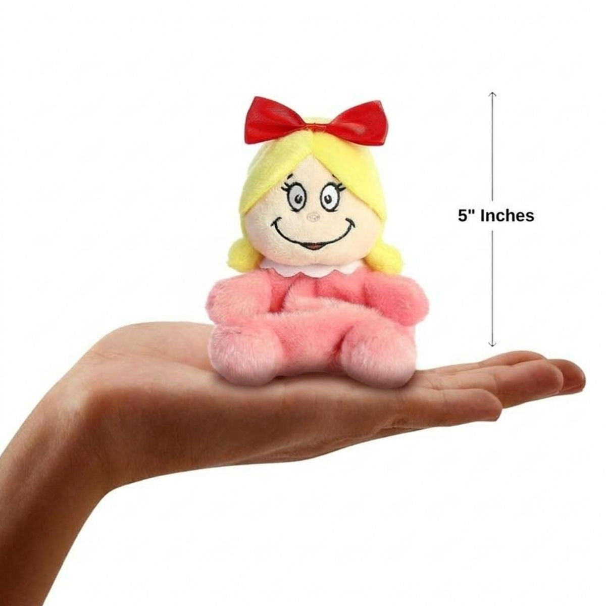 The miniature Cindy-Lou Who plush sitting balanced in an open human hand under a 5-inch height graphic indicator.