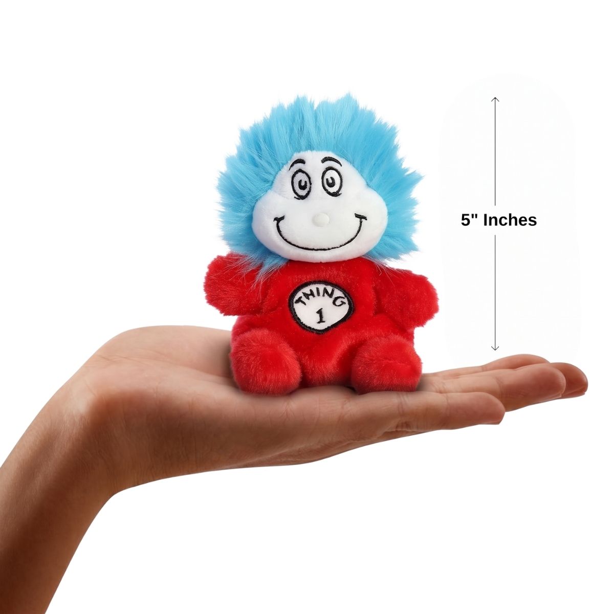 The miniature Thing 1 plush sitting balanced in an open human hand under a 5-inch height graphic indicator.