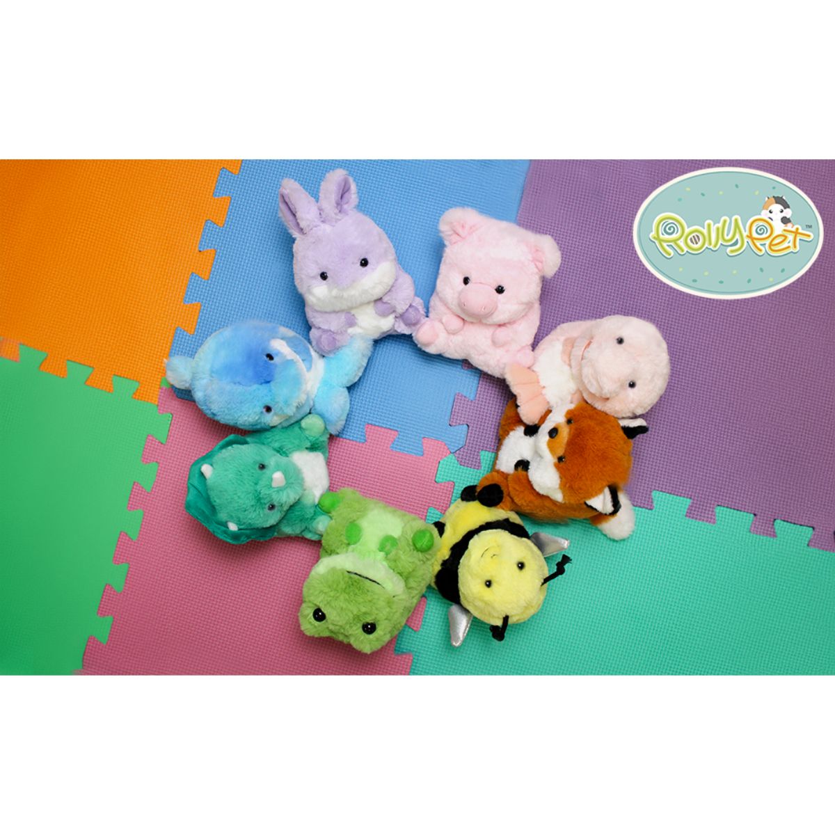 Group shot of the Aurora Rolly Pet Hamish Hammerhead Shark sitting on a colorful play mat with other Rolly Pet stuffed animals.