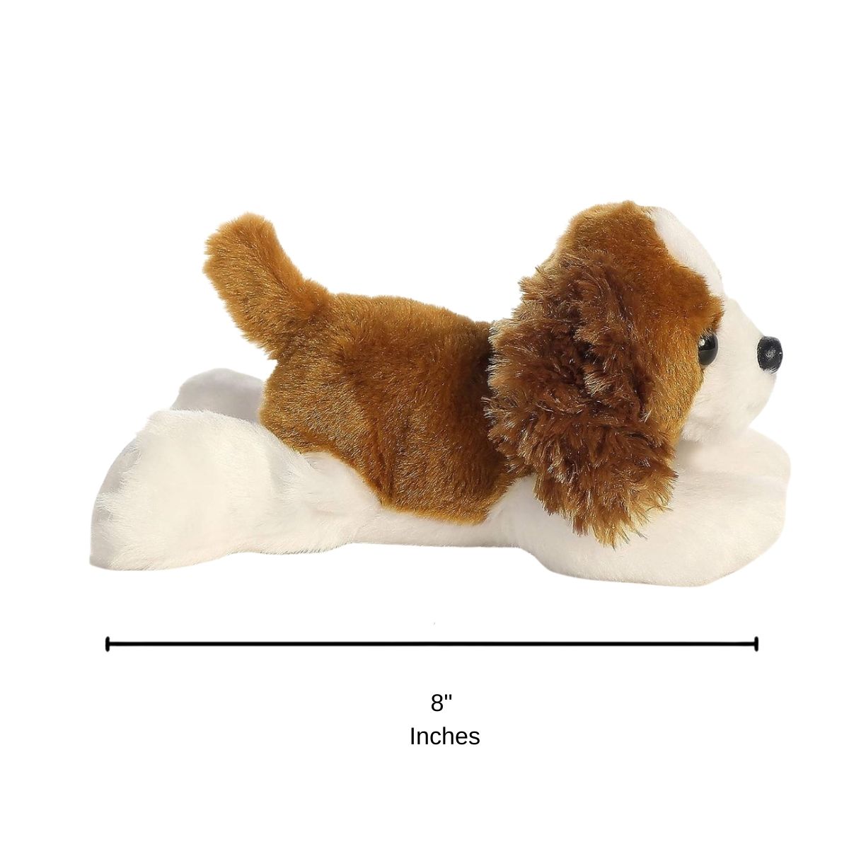 Side profile view of the Cavalier plush resting on its tummy with a measurement graphic indicating it is 8 inches long.