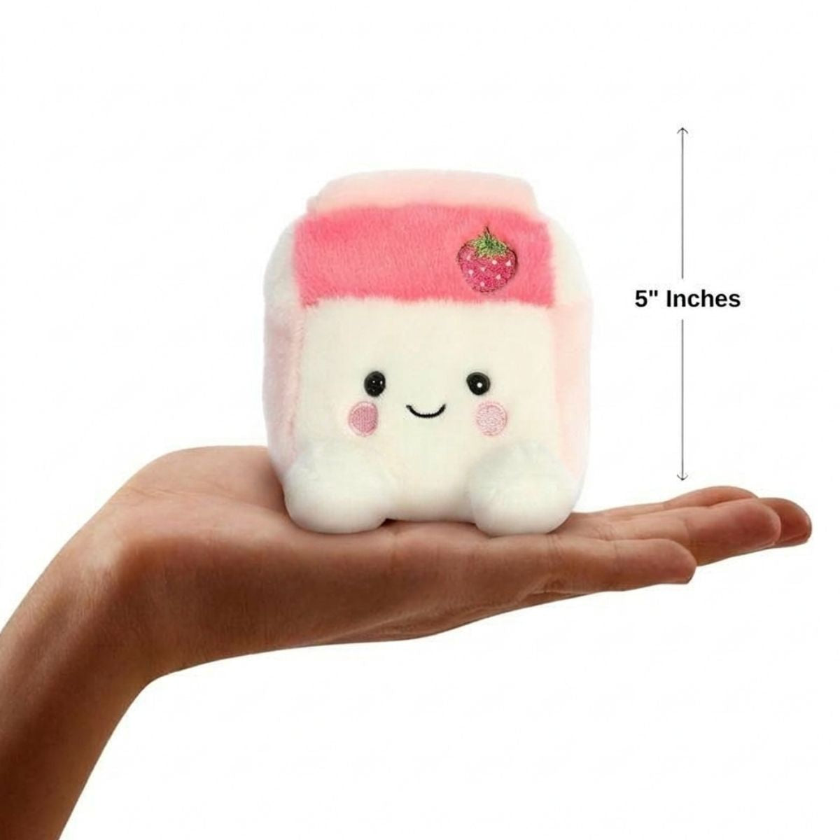 The miniature Fresa Strawberry Milk plush sitting balanced in an open human hand under a 5-inch height graphic indicator.