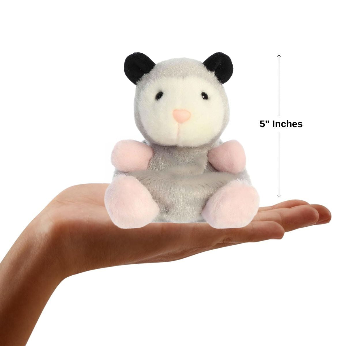 The miniature Sherri Opossum plush sitting inside an open human hand displaying a 4.5-inch height indicator graphic.