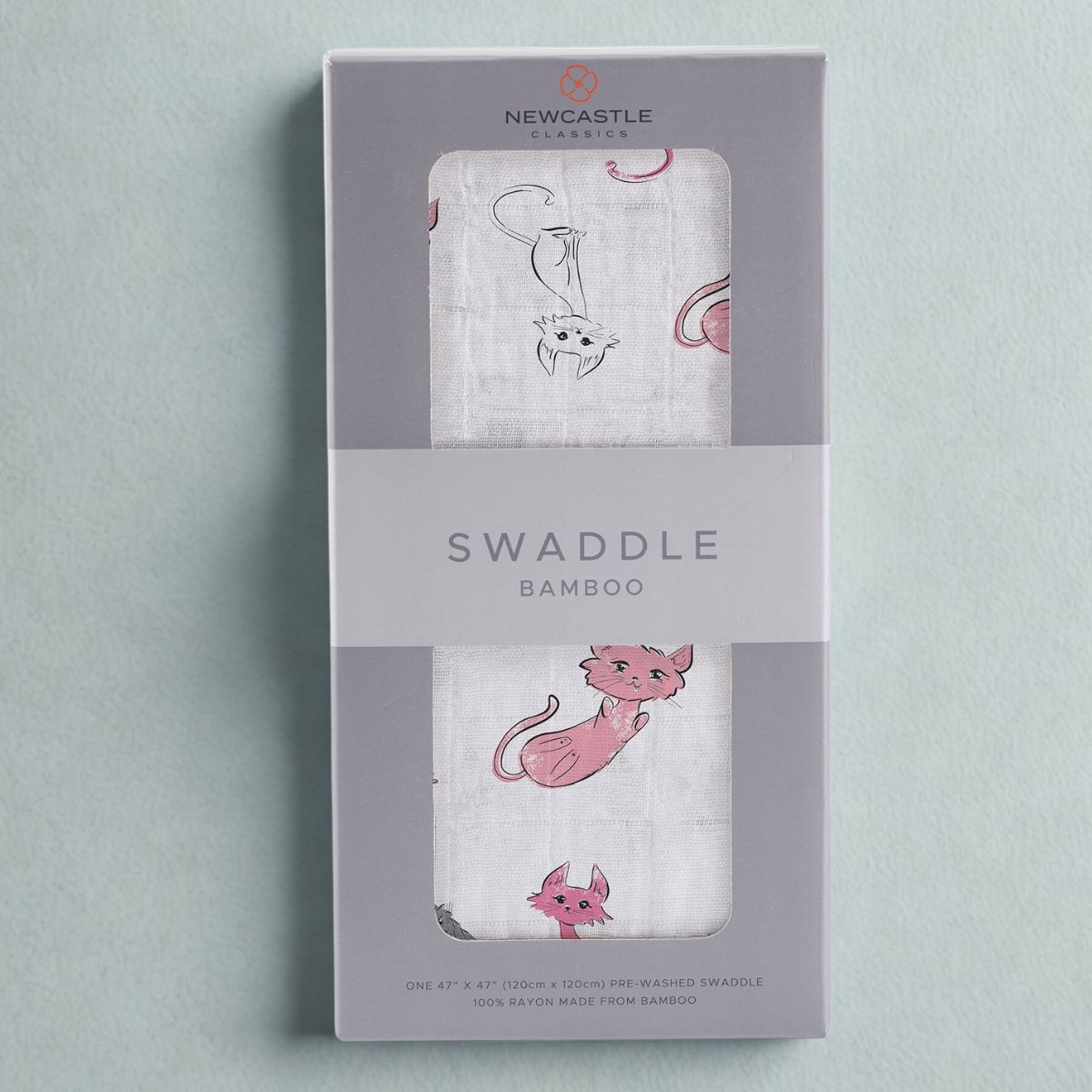 Straight front view of the packaged Playful Kitty baby swaddle blanket inside a grey Newcastle Classics box.