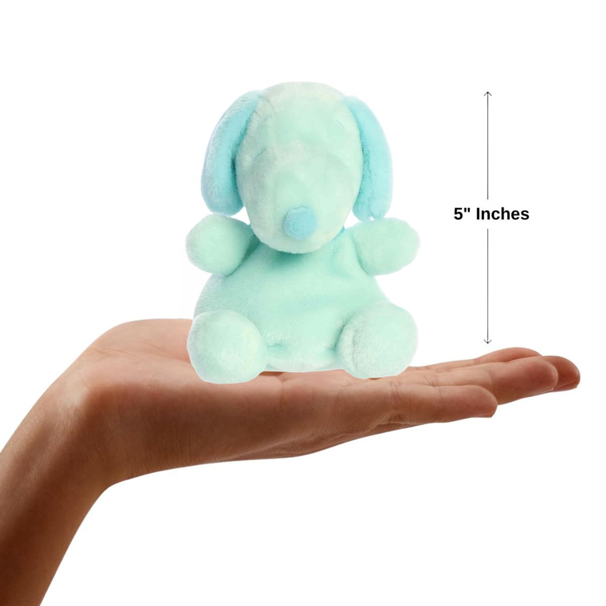 Dimension graphic showing the 5-inch Aurora Palm Pals Peanuts Teal Snoopy resting comfortably in a person's hand with a 5-inch height label.