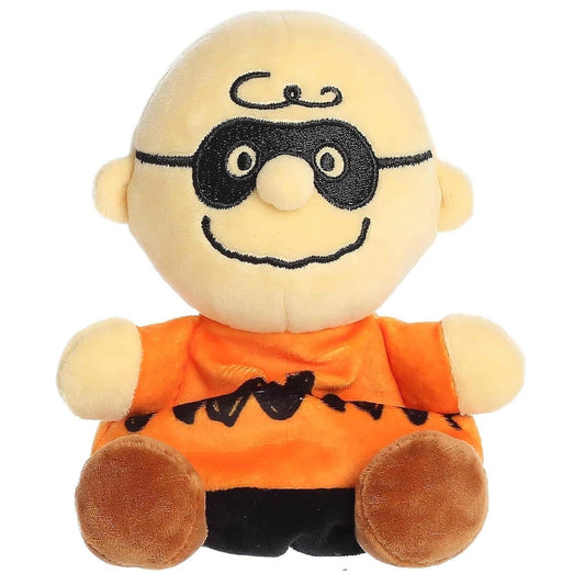 Front view thumbnail of the cute Masked Charlie Brown plush sitting straight, highlighting his wide stitched smile and symmetrical black eye mask.