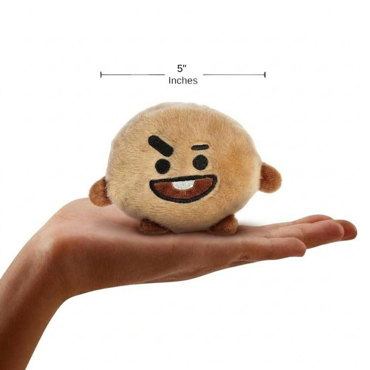 The miniature BT21 SHOOKY plush sitting balanced in an open human hand under a 5-inch height graphic indicator.