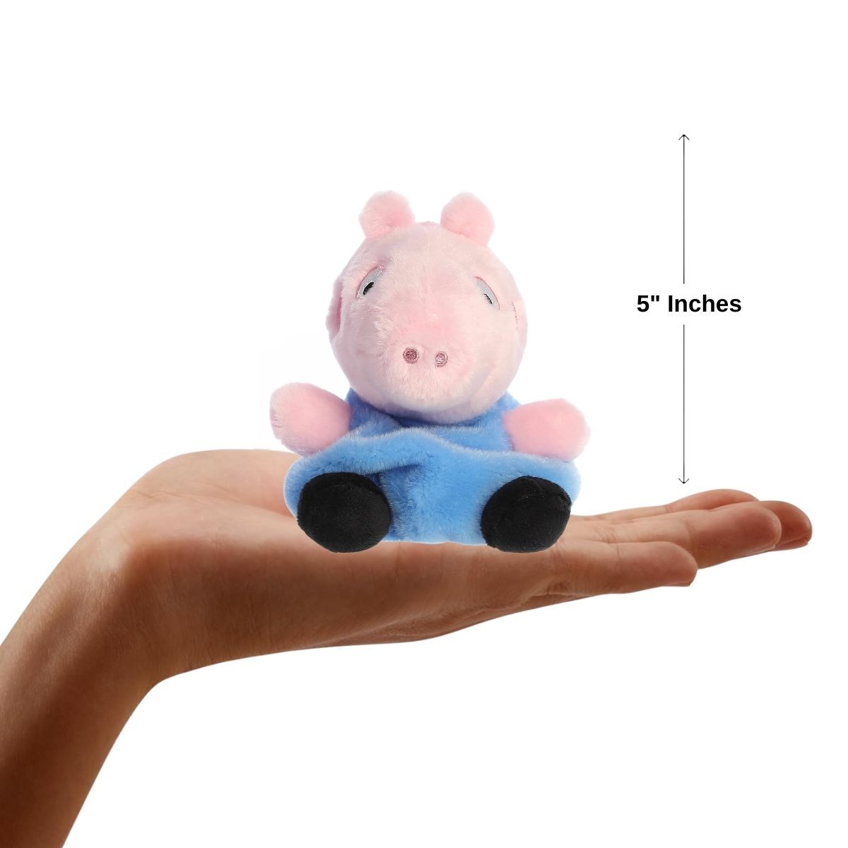 The miniature George Pig plush sitting inside an open human hand displaying a 5-inch height indicator graphic.