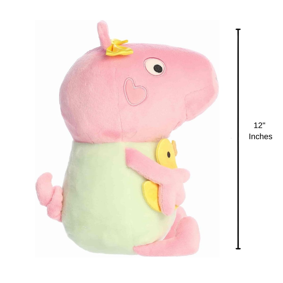 Side profile view thumbnail of the baby pig plush displaying her prominent snout, embroidered heart cheek detail, and a 12-inch height measurement graphic indicator.