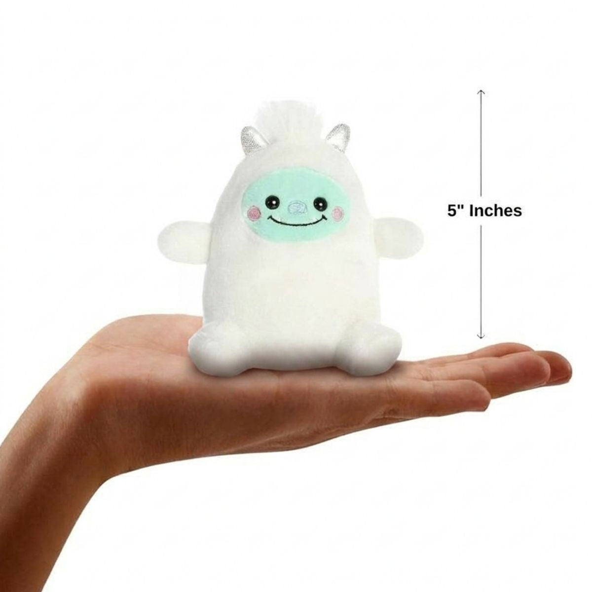 The miniature Baker Yeti plush sitting balanced in an open human hand under a 5-inch height graphic indicator.