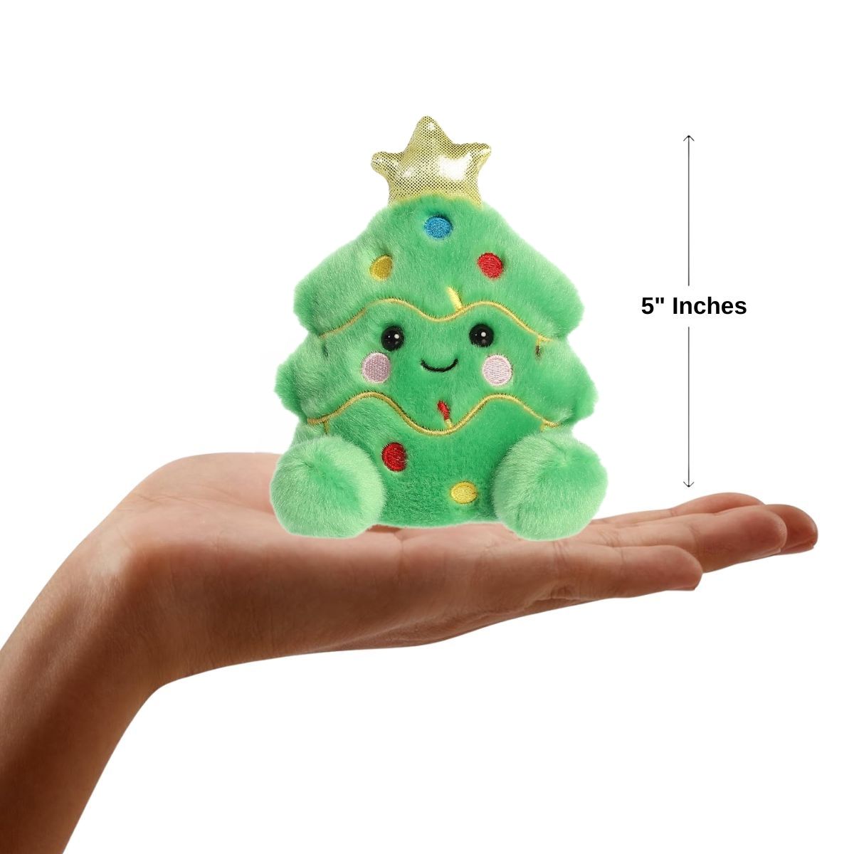 The miniature Douglas Christmas Tree plush resting flat inside an open human hand indicating its 5-inch height dimension.