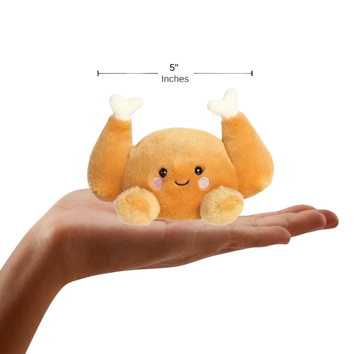 The miniature Wishbone Turkey plush sitting inside an open human hand displaying a 5-inch width indicator graphic.