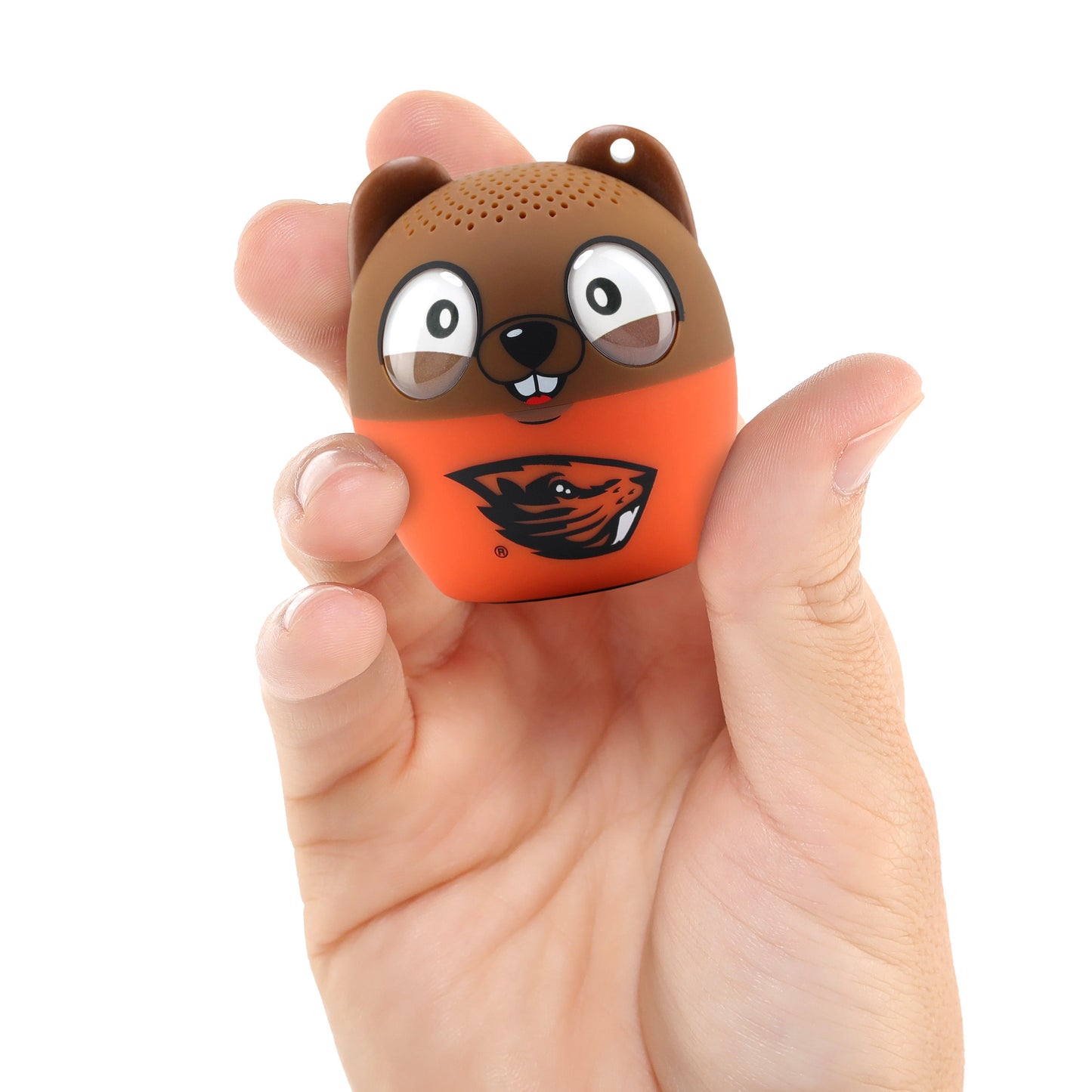 A hand holding the Bitty Boomers Oregon State Beavers mini Bluetooth speaker, demonstrating its ultra-portable, 2-inch pocket size.