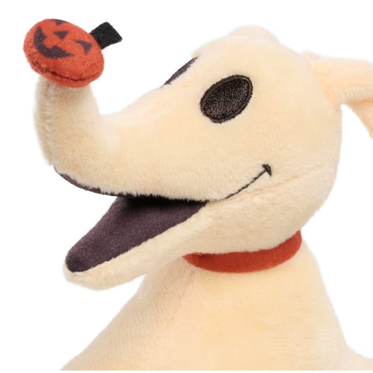 Close-up view of Disney Zero 7-inch mini plush head showing open mouth and orange pumpkin nose.