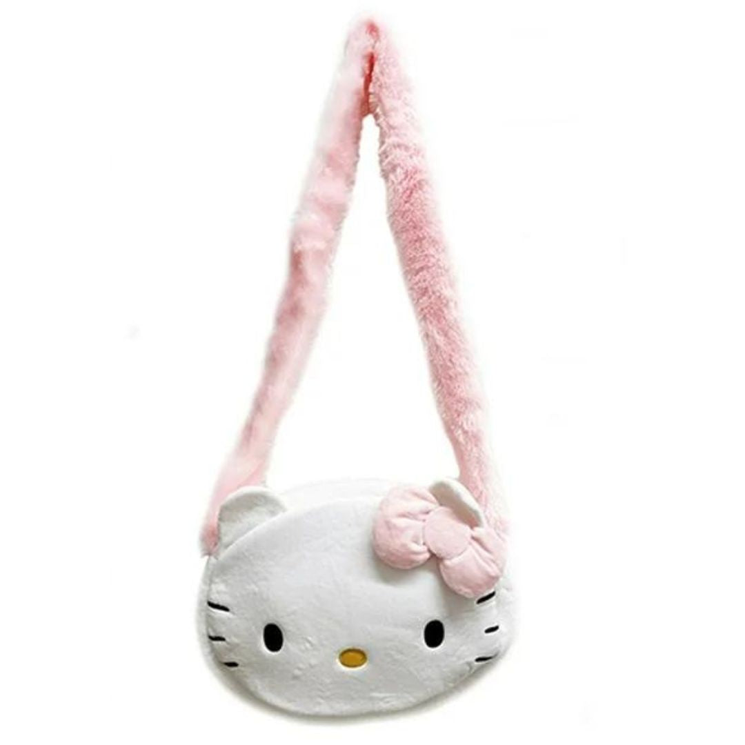 Full length view of the Hello Kitty plush crossbody bag showing the long, fluffy pastel pink shoulder strap fully extended and ready to wear.