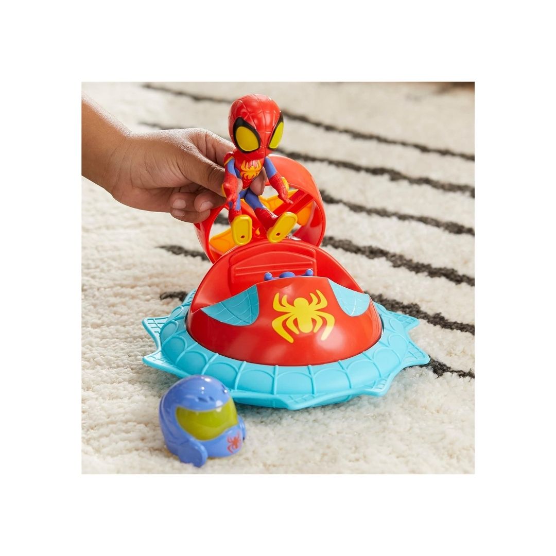 Lifestyle thumbnail showing a child playing on the floor with the Spidey Hover Spinner vehicle and helmet accessory.