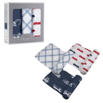 Three Newcastle Classics Things That Go cotton muslin swaddle blankets partially unrolled next to their grey 3-pack window packaging box.