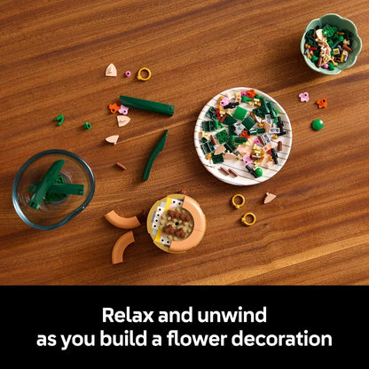 Tabletop scene with building blocks and small items on a wooden surface, accompanied by text 'Relax and unwind as you build a flower decoration'.