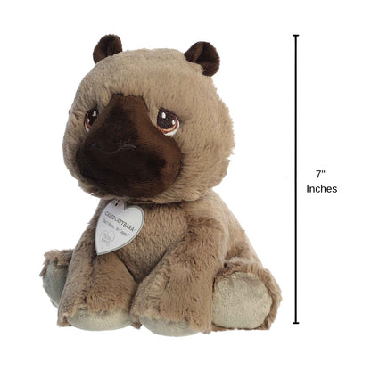 Sizing graphic showing the 7-inch Precious Moments Caleb Capybara plush sitting next to a measurement line to demonstrate its scale.