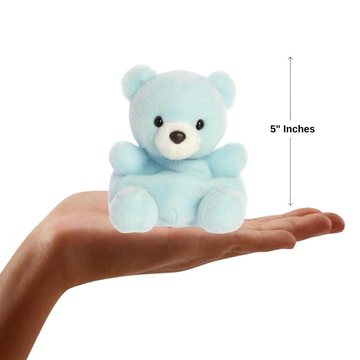 Sizing graphic showing the 5-inch Palm Pals Benny Bear plush sitting perfectly in the palm of a hand to demonstrate its small scale.