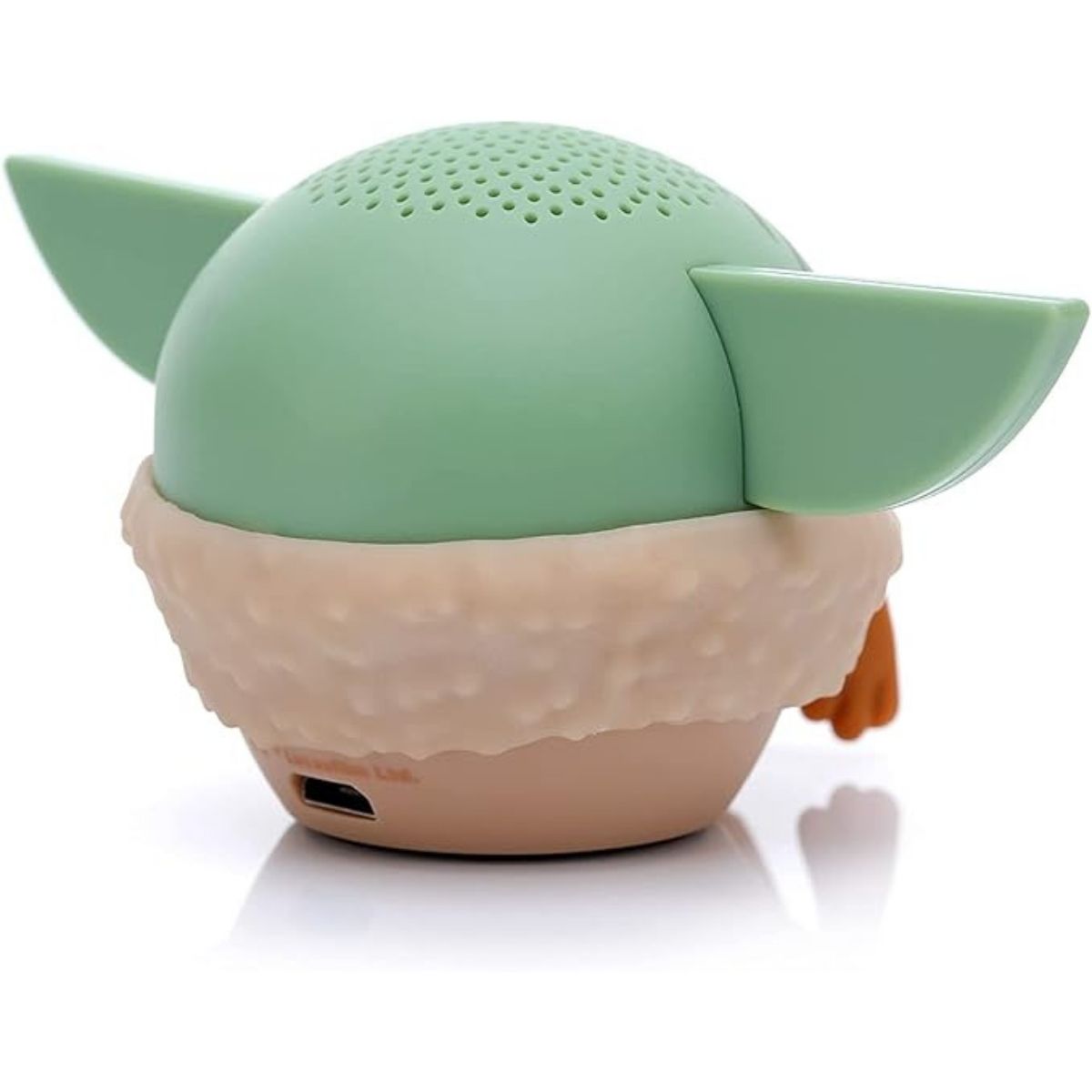 Back view of the Bitty Boomers Grogu speaker showing the top speaker grill holes and the lower micro-USB charging port.