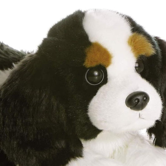 Close-up view of the Cavalier Spaniel stuffed animal highlighting its sweet face, long black floppy ears, and signature tan eyebrow spots.