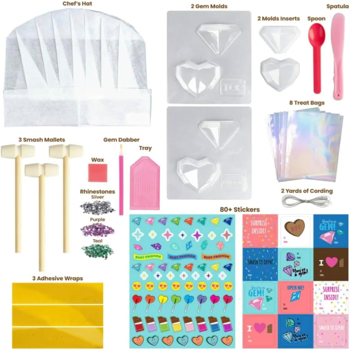 Collection of gem-making supplies including a chef's hat, molds, and decorative items.