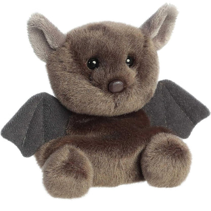 Aurora 5-inch Palm Pals Luna Bat plush toy sitting forward showing its fuzzy taupe-brown body, outspread charcoal bat wings, and large pointed ears.