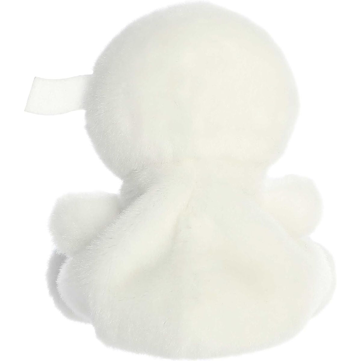 Rear thumbnail view of the Aurora mummy stuffed toy displaying its plush white back and a tiny loose bandage fabric tab extending from the head.