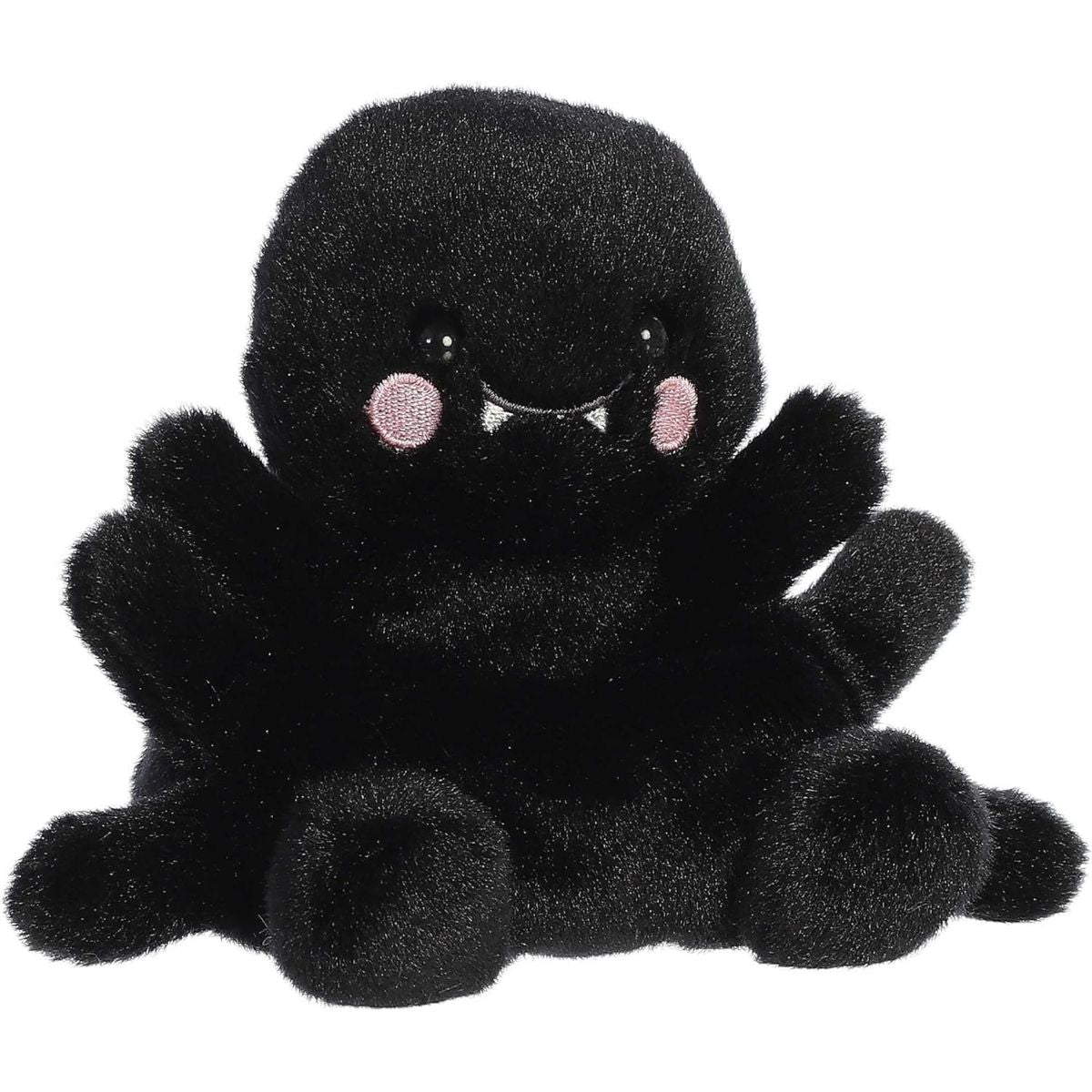 Aurora 5-inch Palm Pals Penny Mae Spider plush toy showing its jet-black fuzzy body, soft legs extending outwards, and cute face with tiny white fangs and pink cheeks.