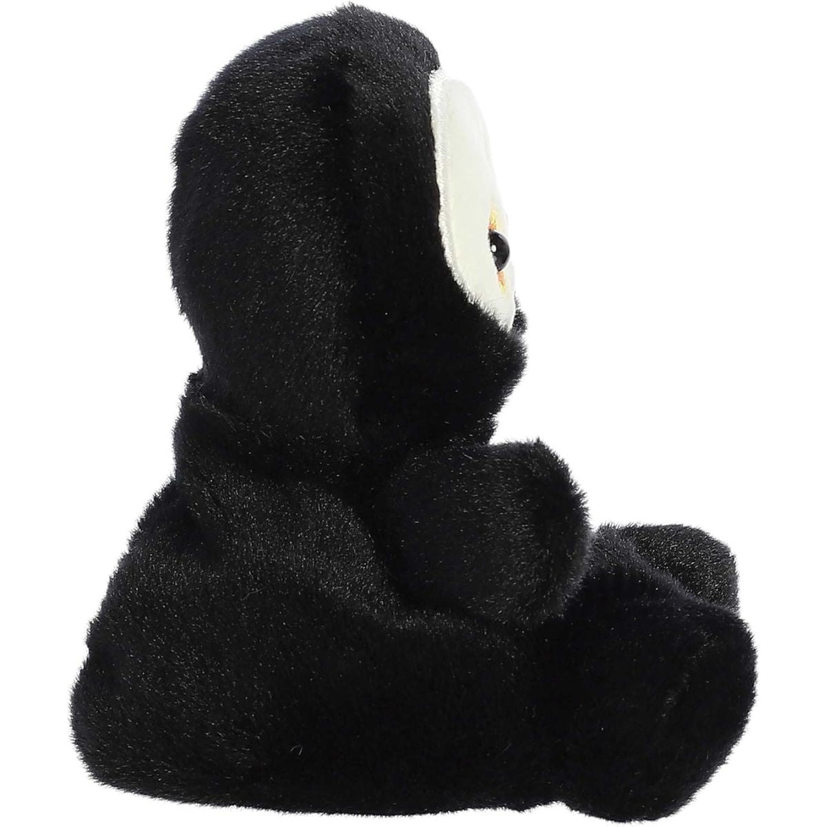 Side profile thumbnail of the mini skeleton plush showcasing its rounded plush depth and soft sitting posture.