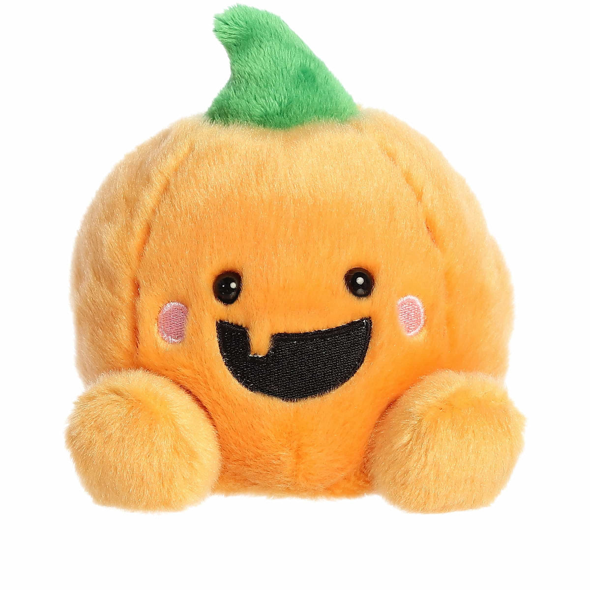 Plush pumpkin toy with a smiling face on a white background