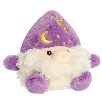 Aurora 5-inch Palm Pals Ezerick Wizard plush toy sitting forward showing its purple wizard hat with an embroidered yellow moon and stars and a big fluffy white beard.