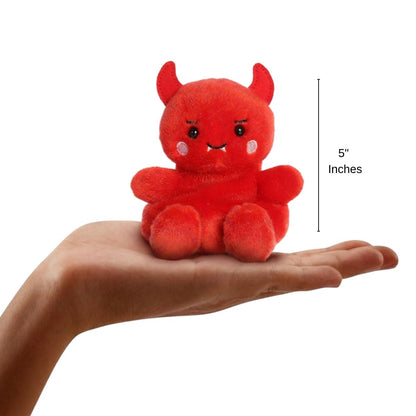 The miniature Damien Devil plush sitting balanced in an open human hand under a 5-inch height graphic indicator.