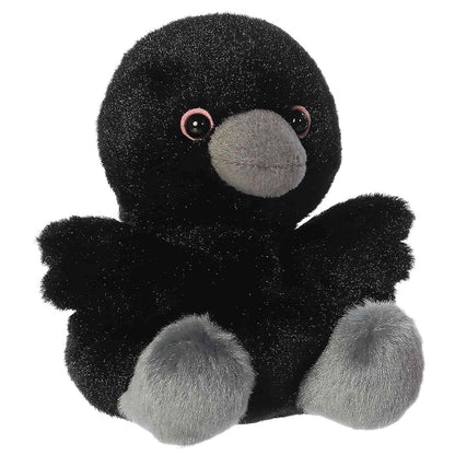 Aurora 5-inch Palm Pals Poe Raven plush toy sitting at an angle showing its fluffy jet-black body, grey beak, and pink-rimmed eyes.