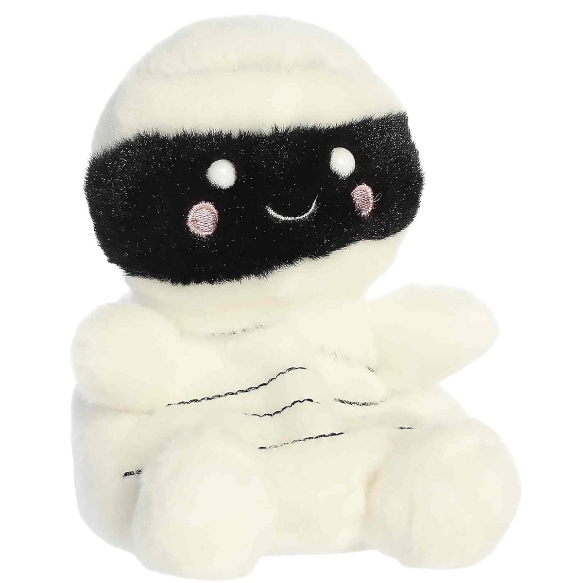 Aurora 5-inch Palm Pals Wraphael Mummy plush toy sitting forward showing its cream-white wrapped body, black eye band, and pink cheeks.