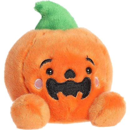 Aurora 5-inch Palm Pals Jackson O'Lantern plush toy showing its round orange pumpkin body, green top stem, and a wide open jagged black embroidered smile with rosy pink cheeks.