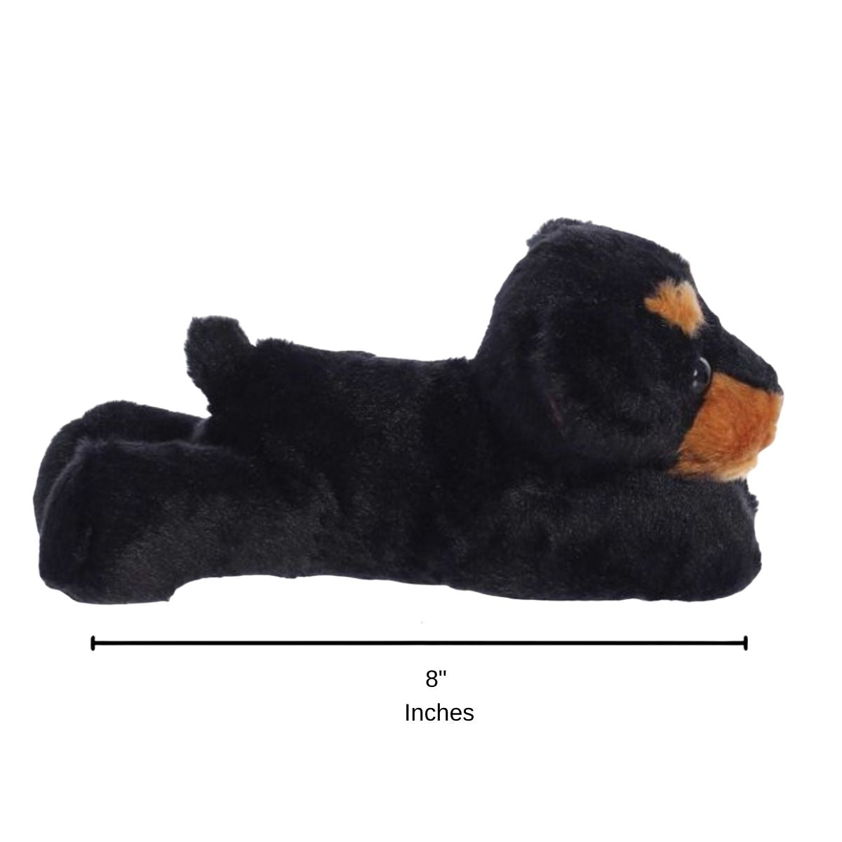 Full side profile of the resting black and tan dog plush with a dimension line indicating its 8-inch length.