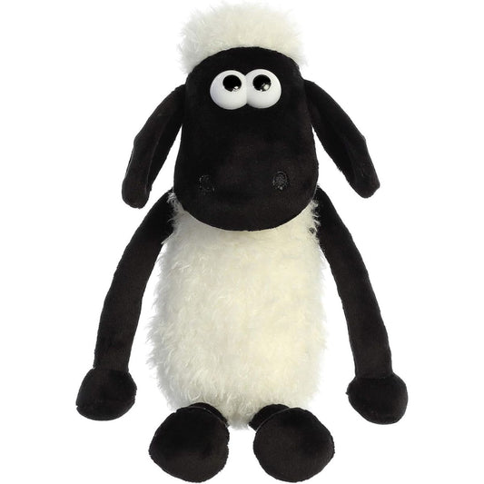 Straight front view of the Shaun the Sheep plush sitting upright with its long black arms resting at its sides.