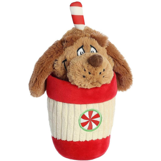 Slightly angled front view of the Max the Dog peppermint cup plush showing his sweet embroidered face and candy cane-striped antler.