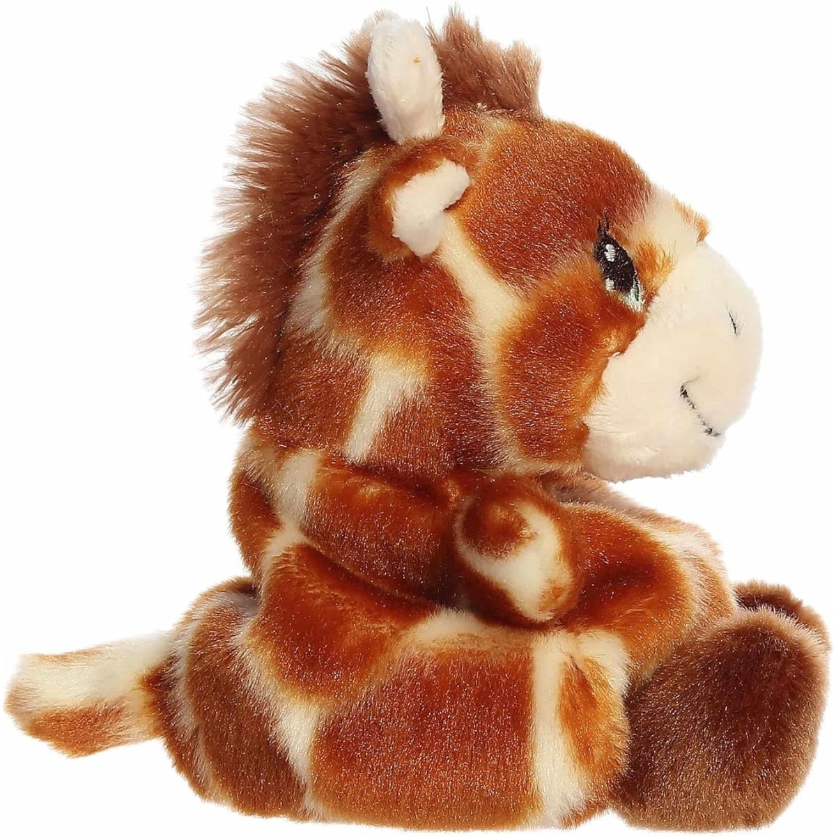 The right side profile view of the sitting Aurora Palm Pals giraffe plush highlighting its dark brown plush mane.