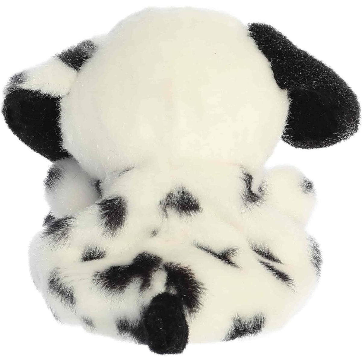 Back view of the Aurora dalmatian puppy plush showcasing its soft white fur dotted with black spots and its solid black ear.