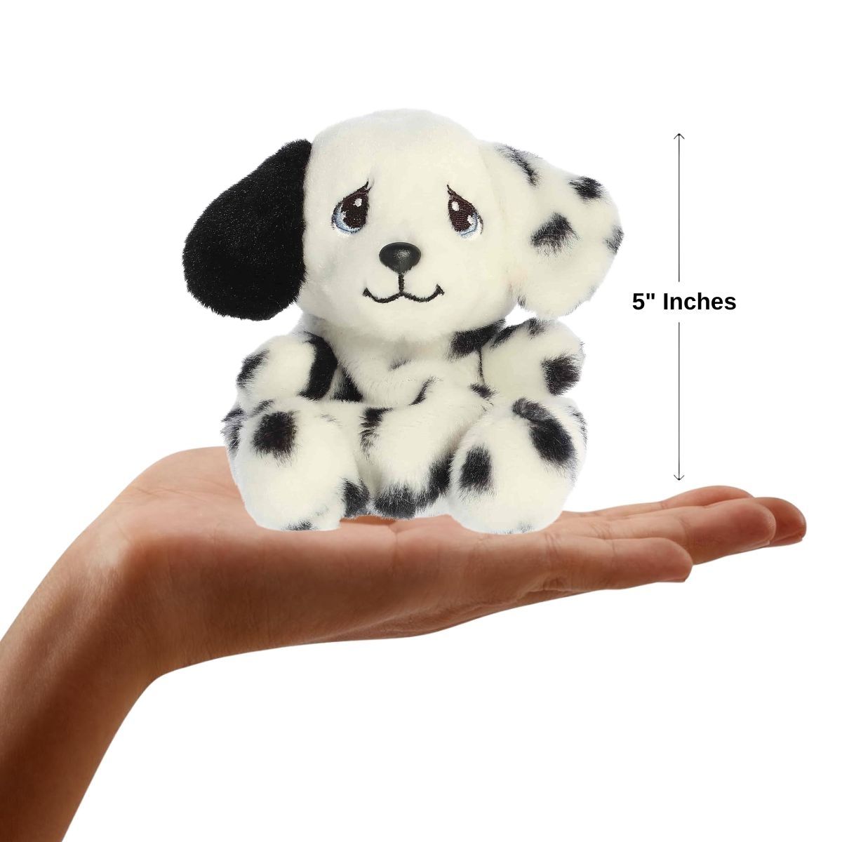 Sizing graphic showing the 5-inch Palm Pals Precious Moments Barkley Dalmatian plush sitting perfectly in the palm of a hand to demonstrate its small scale.