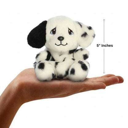 Sizing graphic showing the 5-inch Palm Pals Precious Moments Barkley Dalmatian plush sitting perfectly in the palm of a hand to demonstrate its small scale.