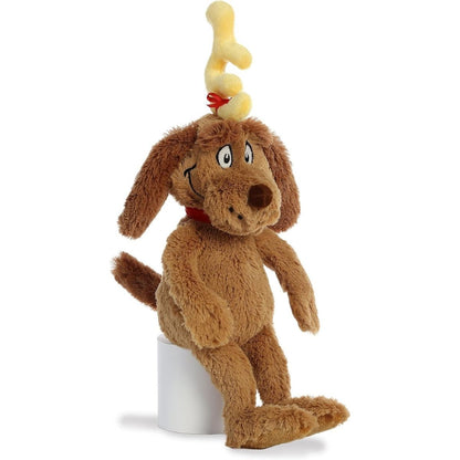 Side angled view of the brown Max stuffed animal sitting upright, highlighting his cute little tail and soft textures.