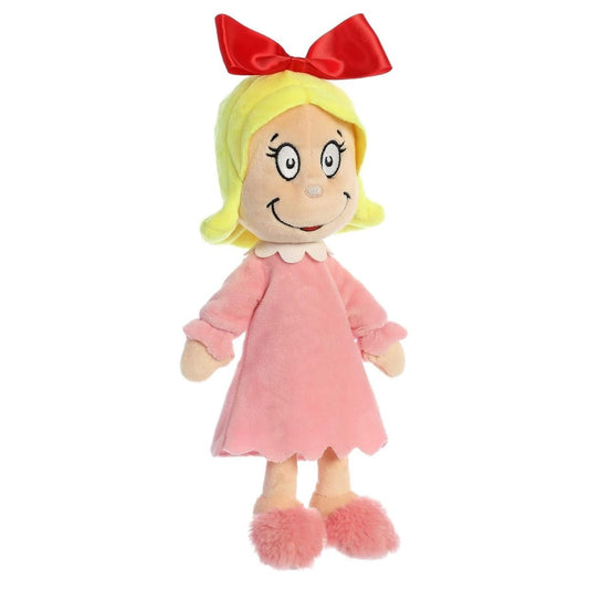 Aurora 12-inch Dr. Seuss Cindy Lou Who plush doll featuring yellow hair with a large red bow, a soft pink nightgown dress, and fluffy pink slippers.