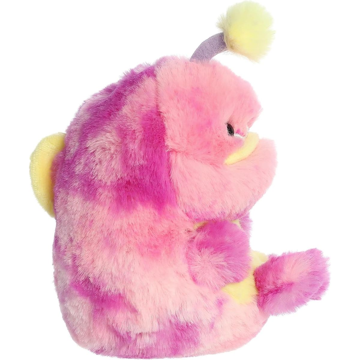 Side profile view of the Aurora angler fish plush showing the yellow lure resting over its head and its small fins.