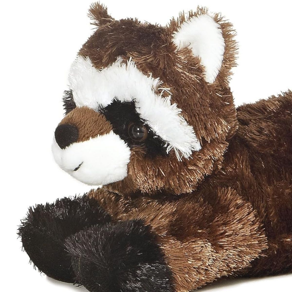Close-up angled front view of the soft Mini Flopsie raccoon plush showing its white and black face mask and dark paws.