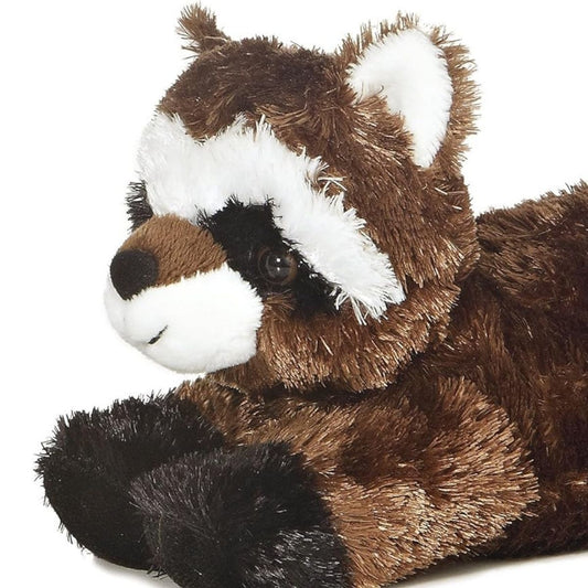 Close-up angled front view of the soft Mini Flopsie raccoon plush showing its white and black face mask and dark paws.